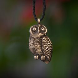 Owl pendant on black leather cord. Bird necklace. wisdom sign. Pagan symbol handcrafted jewelry.
