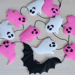 Pink Halloween garland with ghosts and bat. Halloween banner party decor indoor and outdoor. Cute Halloween decorations