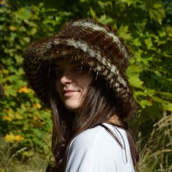 Faux fur hat with animal print. Luxury fashion furry hat. Fluffy bucket hats for women made of raccoon fur. Fuzzy hat.