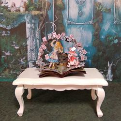 Open book. Dollhouse miniature.Miniature for a dollhouse.1:12 scale.
