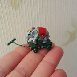 Elephant on a cart. Dollhouse miniature.1:12 scale.