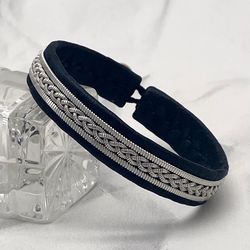 Sami bracelet. Men's black leather bracelet with silver. Scandinavian jewelry. Celtic ethnic style.