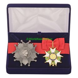 Badge and star of the Order of the Legion of Honor in a gift box. France. Dummies, copies