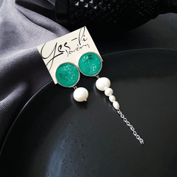 green mismatched earrings, circle enamel studs with natural pearls
