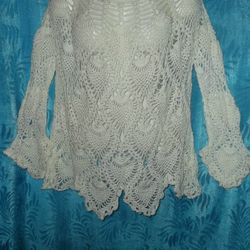 Knitted openwork blouses.