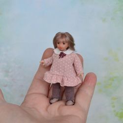 Miniature doll child in 12th scales