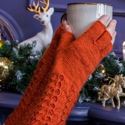 Long fingerless knit orange gloves for women. Handmade.