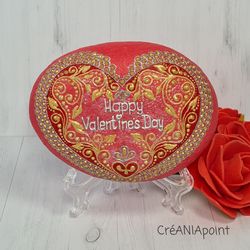 Happy valentines day Decorative heart love mandala in dot painting on painted stone