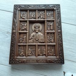 Carved icon of Nicholas the Wonderworker with scenes from his life Handmade