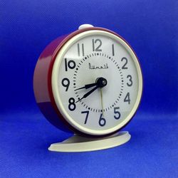 soviet vintage red alarm clock vityaz. mechanical alarm clock ussr