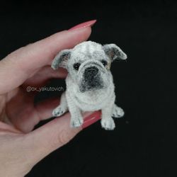 English bulldog. Crocheted dog. A custom-made dog. Amigurumi is a dog. A miniature pet. Puppy souvenir gift. Cute dog