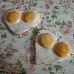 Ceramic heart-shaped scrambled eggs . Valentine's Day ornament