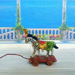 Zebra on Wheels.Toy for a doll. Dollhouse miniature.1:12 scale.
