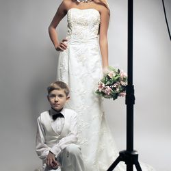 classic stile pensil wedding dress. Ivory synthetic lace fully embellished with pearls embrodery sequins and beads fairy