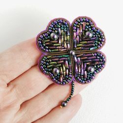 Purple four-leaf clover beaded brooch