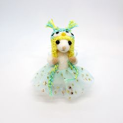 Miniature needle felted mouse in an owl hat and a tutu