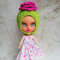 Blythe-hat-knitting-helmet-green-with-pink-rose-flower-1.jpg