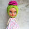 Blythe-hat-knitting-helmet-green-with-pink-rose-flower-5.jpg