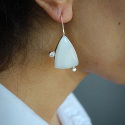 silver earrings with cacholong and zirconias