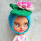 Blythe-hat-knitted-helmet-blue-with-pink-water-lily-12.jpg