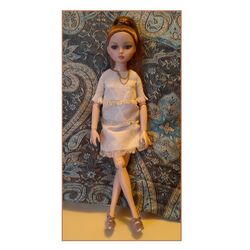 A dress sewing pattern for Tonner 16" Ellowyne Wilde Doll