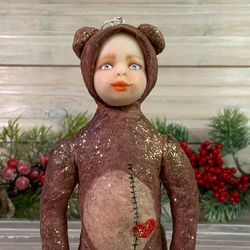 Cotton toy, boy in a bear costume