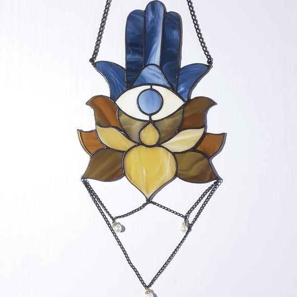 20201108-Stained glass blue evil eye Hamsa hand suncatcher with brown and beige lotus flower and hanging chains on a white background.jpg