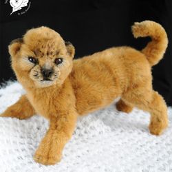 realistic toy lion cub pet portrait wild cat