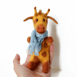 Giraffe toy finger puppet     made of natural wool. I'll make it to order.
