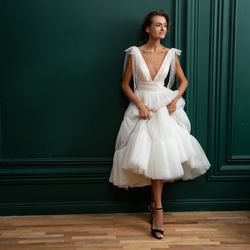 short tulle wedding dress tea-length, with an open back. reception dress prim