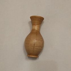 Vase made of hazel wood for dried flowers. Interior decor element. Puppet game.