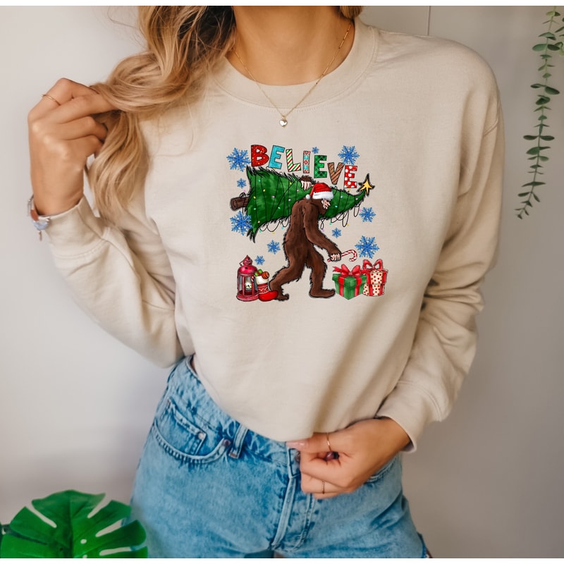 Christmas Believe Bigfoot Comfort colors Sweatshirt, Funny Christmas Believe Merch, Believe Christmas Shirt, Christmas Sweatshirt, big foot.jpg