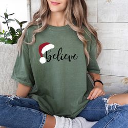 christmas believe comfort colors shirt, christmas shirt, disney t-shirt, disney christmas shirt, disney family trip shir