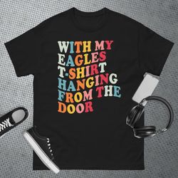 with my eagles t-shirt hanging from the door original, gold rush, wave, t-shirt