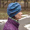 woman-in-blue-hat-profile