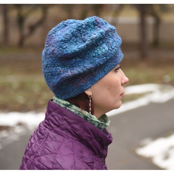 woman-in-blue-hat-profile