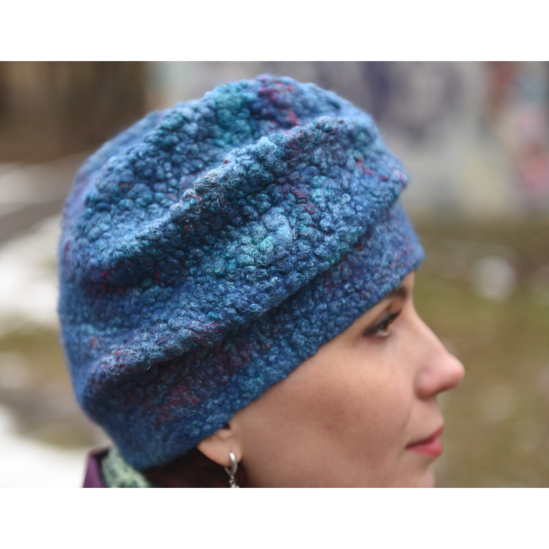 woman-in-blue-hat-close