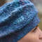 woman-in-blue-hat-close