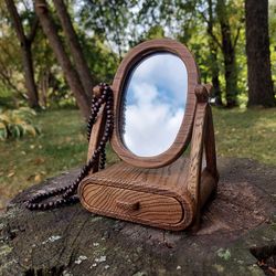 Swivel cosmetic mirror handcrafted from natural wood