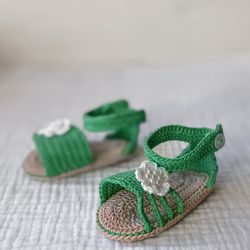 Green sandals Karine with a flower for a newborn girl