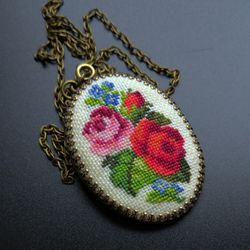 Embroidered pendant with flowers