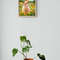 Pot_plant_on_wooden_stool.jpg