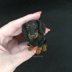 Black Dachshund. Miniature decorative dachshund. Crocheted Dog sausage gift. The dachshund is a souvenir. OxYakutovich