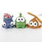Crochet Om Nom, Roto and Toss from the cartoon Cut the Rope