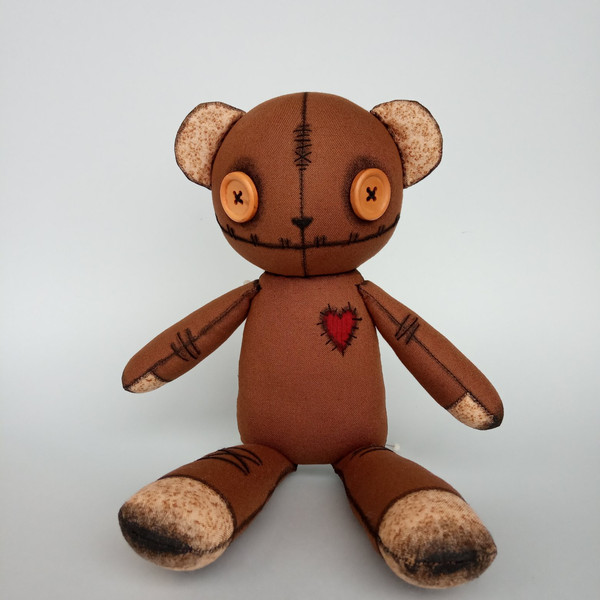 Creepy-cute-brown-stuffed-bear-with-button-eyes-5