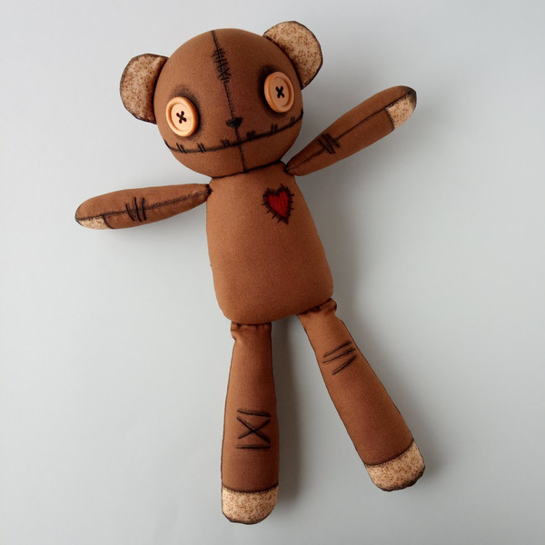 Creepy-cute-brown-stuffed-bear-with-button-eyes-3