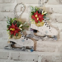 Christmas figure skates decorated with winter decor