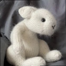 Knitted toy realistic rabbit, a gift for bunny lovers