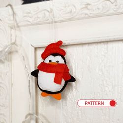 Penguin Christmas ornament pattern and tutorial with photos on how to make cute penguin.  Completely hand sewn, no need