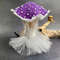 creepy mushroom doll in purple hat